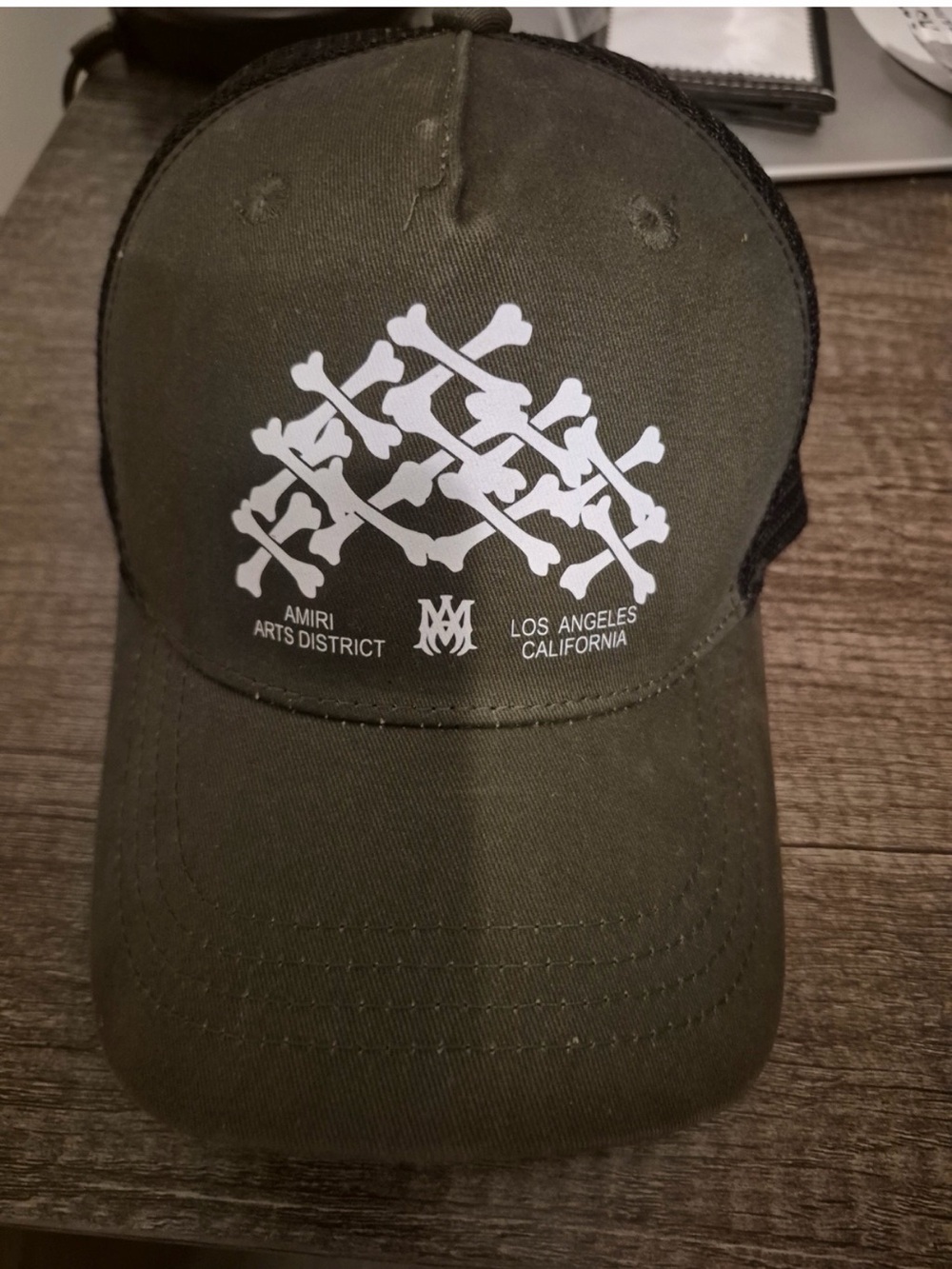 AMIRI Olive Green Trucker Cap with White Skull Crossbones Graphic
